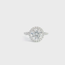 Round Cut Diamond Ring with Central & Additional Diamonds